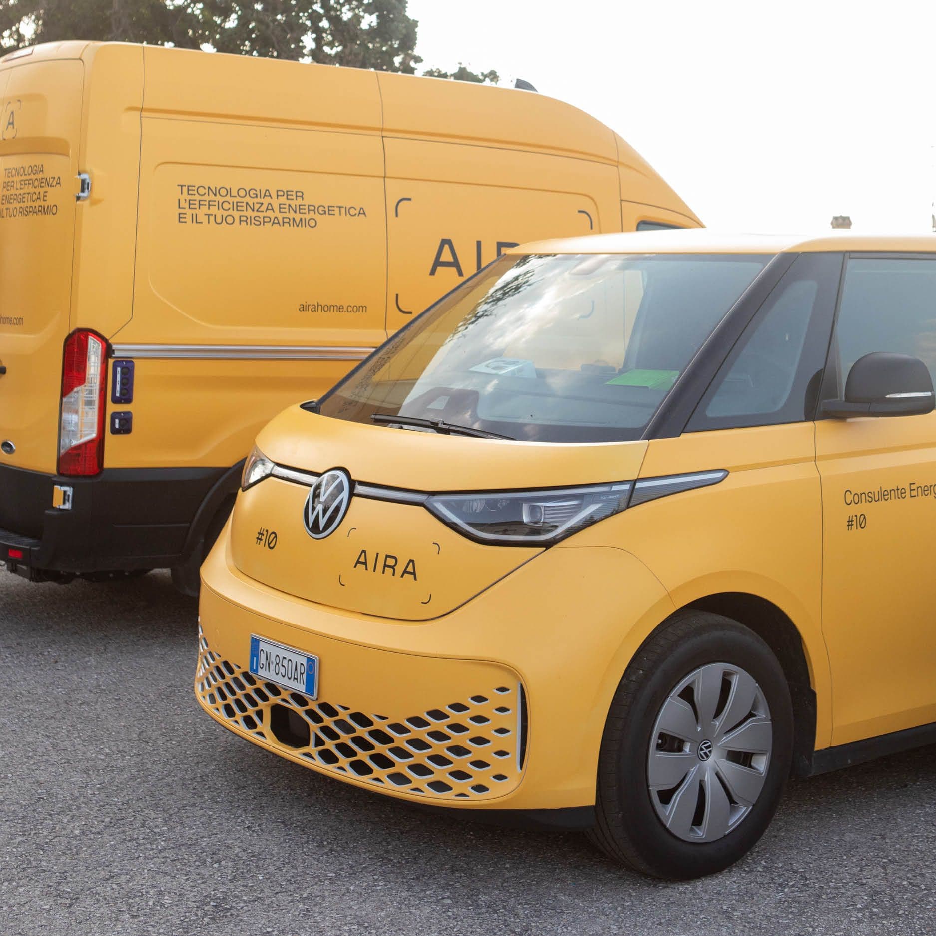 Two Aira branded vans