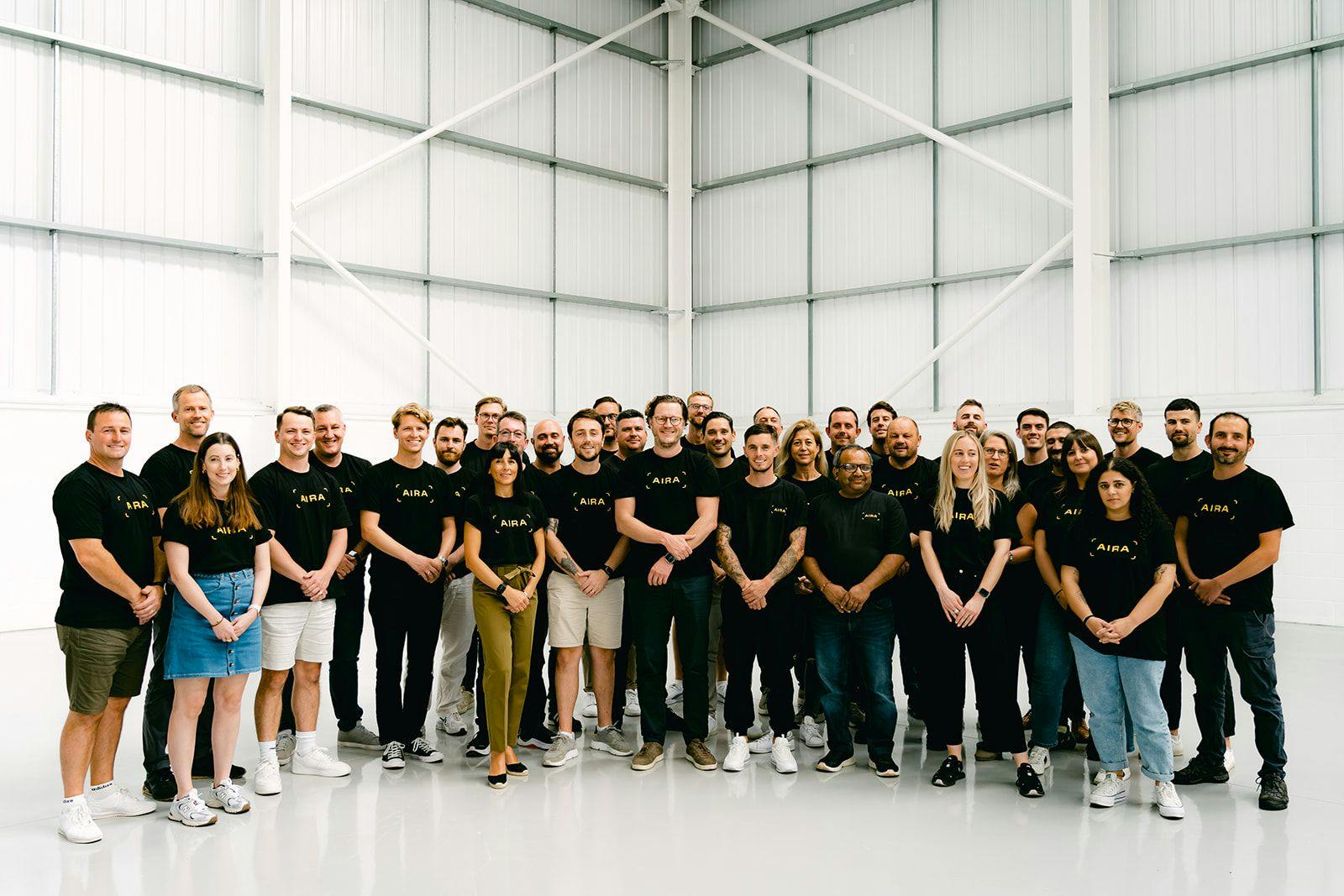 Aira UK Team in a warehouse