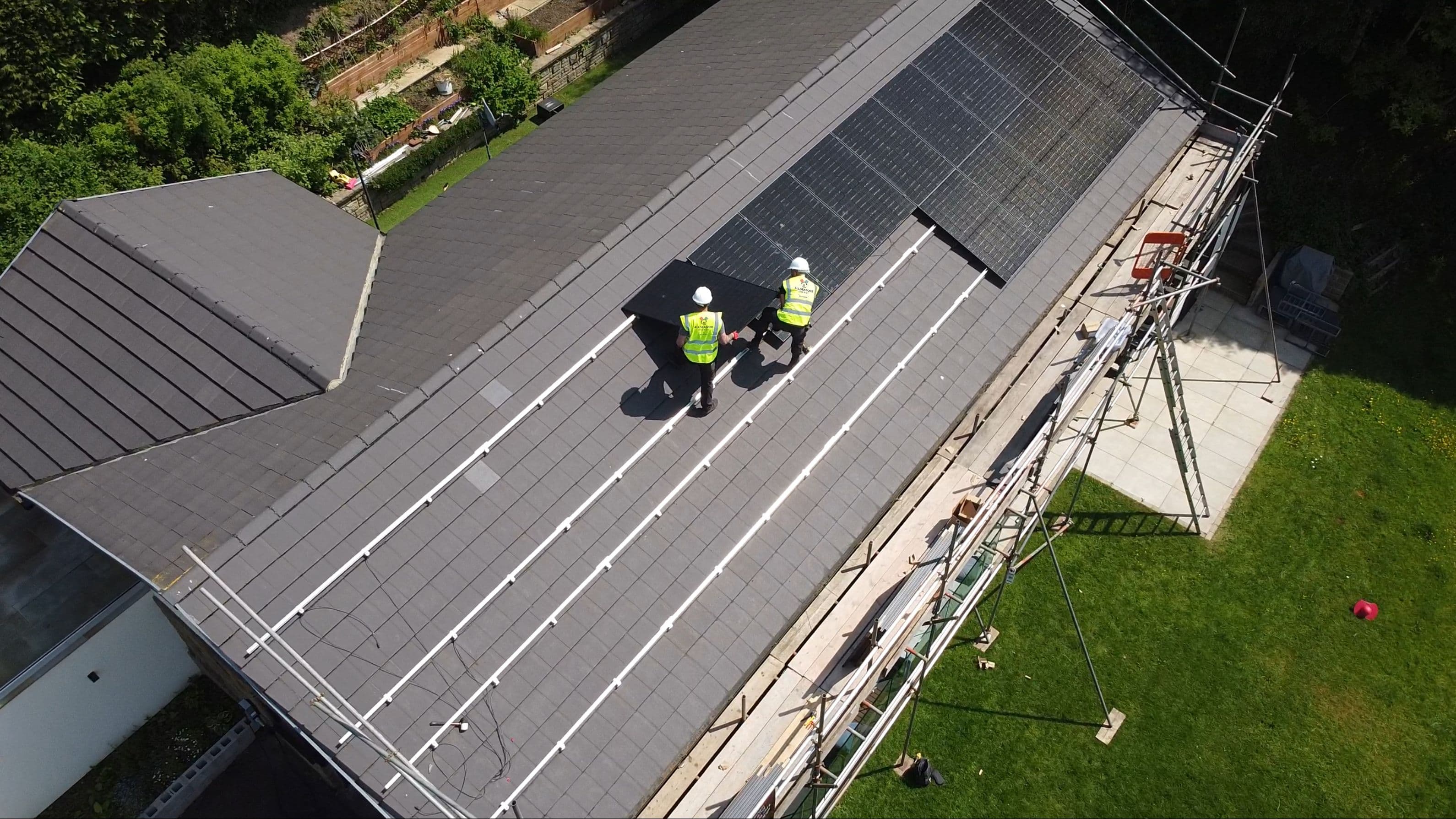 Solar panels being installed on UK home