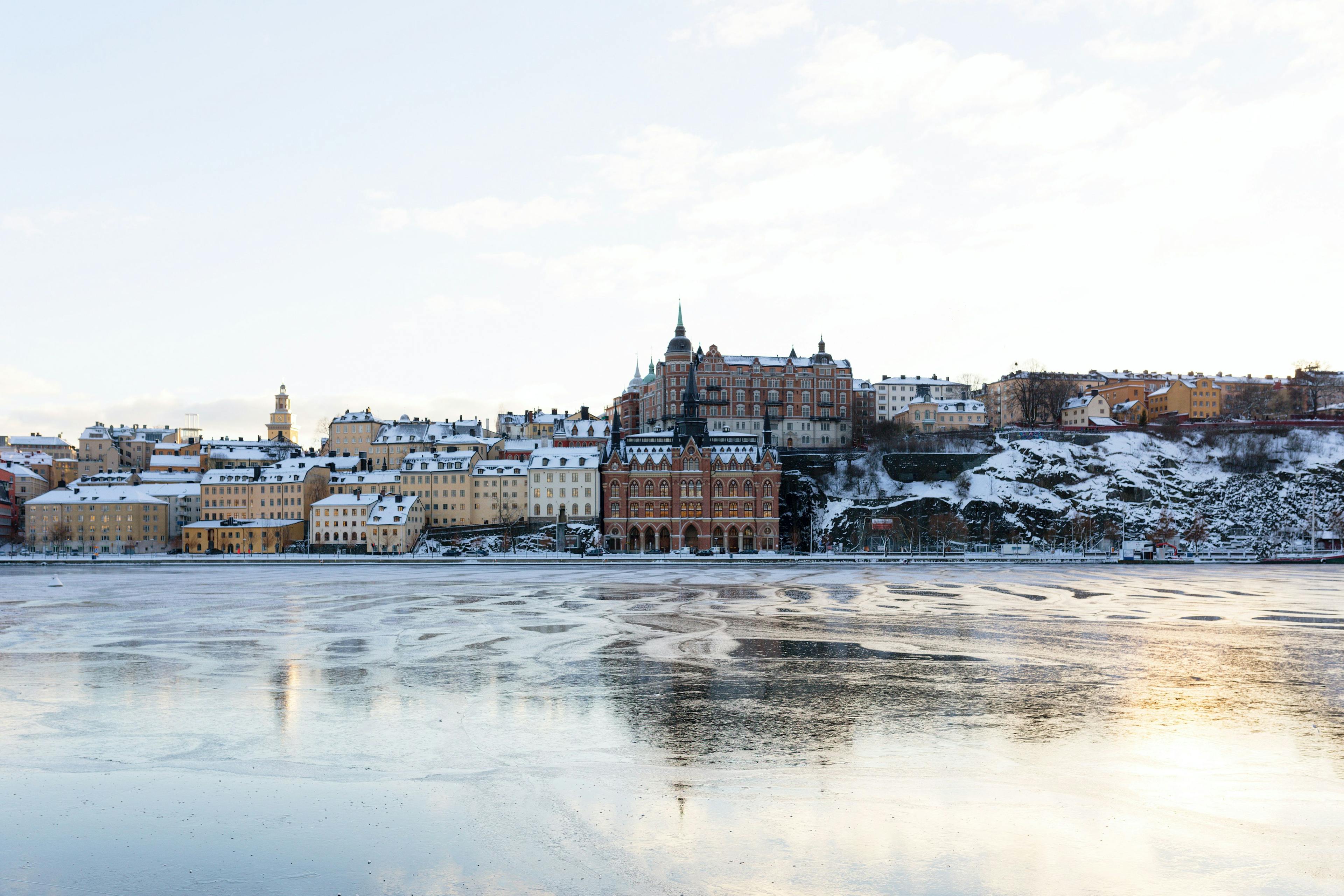 Cold winter light shining upon ice. Stockholm Södermalm in the background.